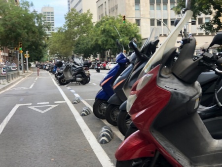 Scooters and motorcycles line the streets of Barcelona